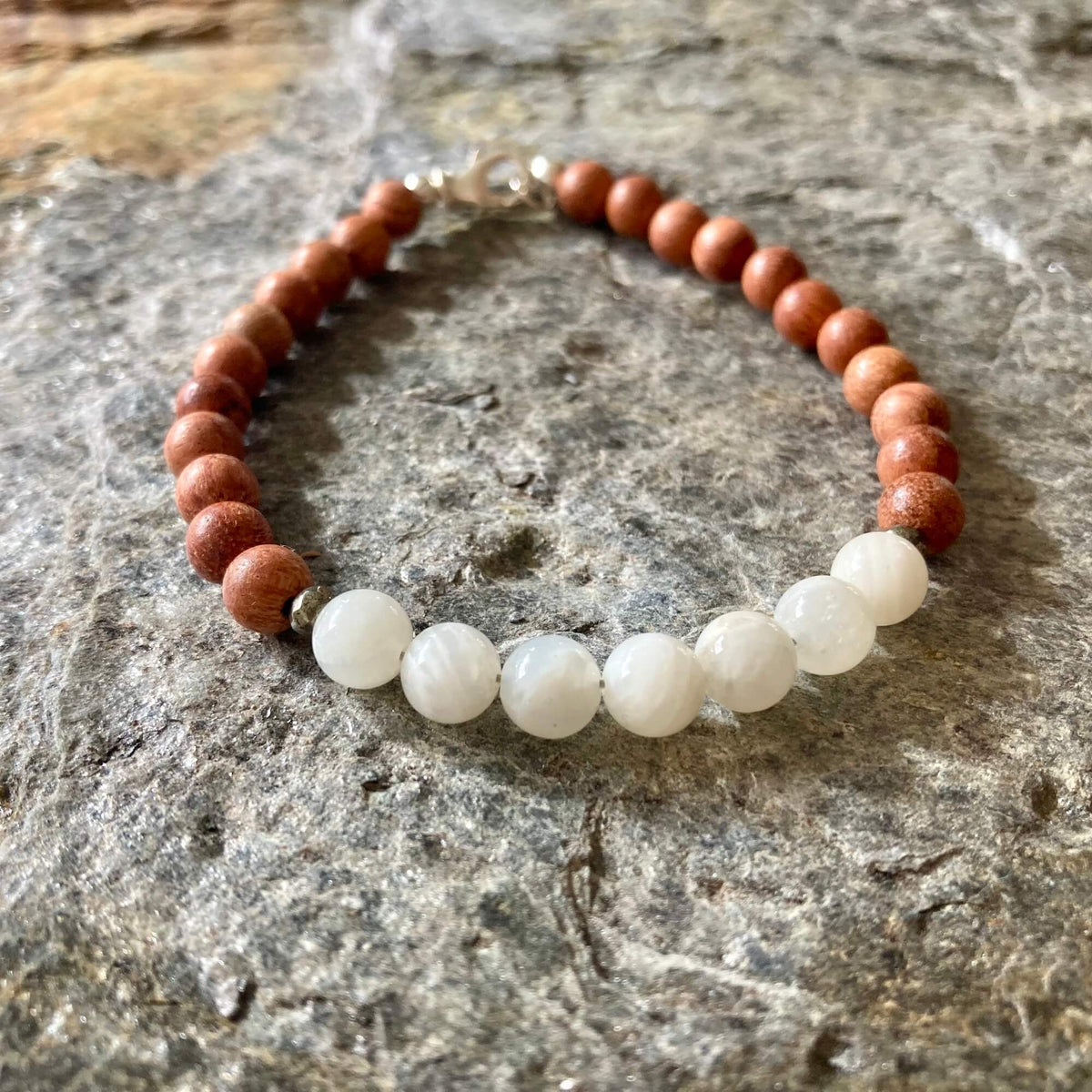 Balance bracelet on grey stone, moonstone beads at the front
