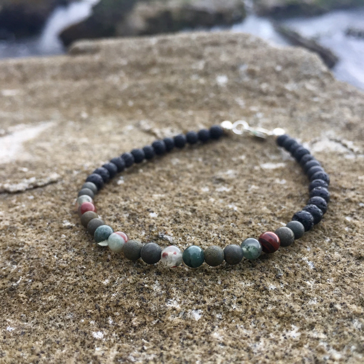 Conviction bracelet on sandstone, sterling silver clasp at the back