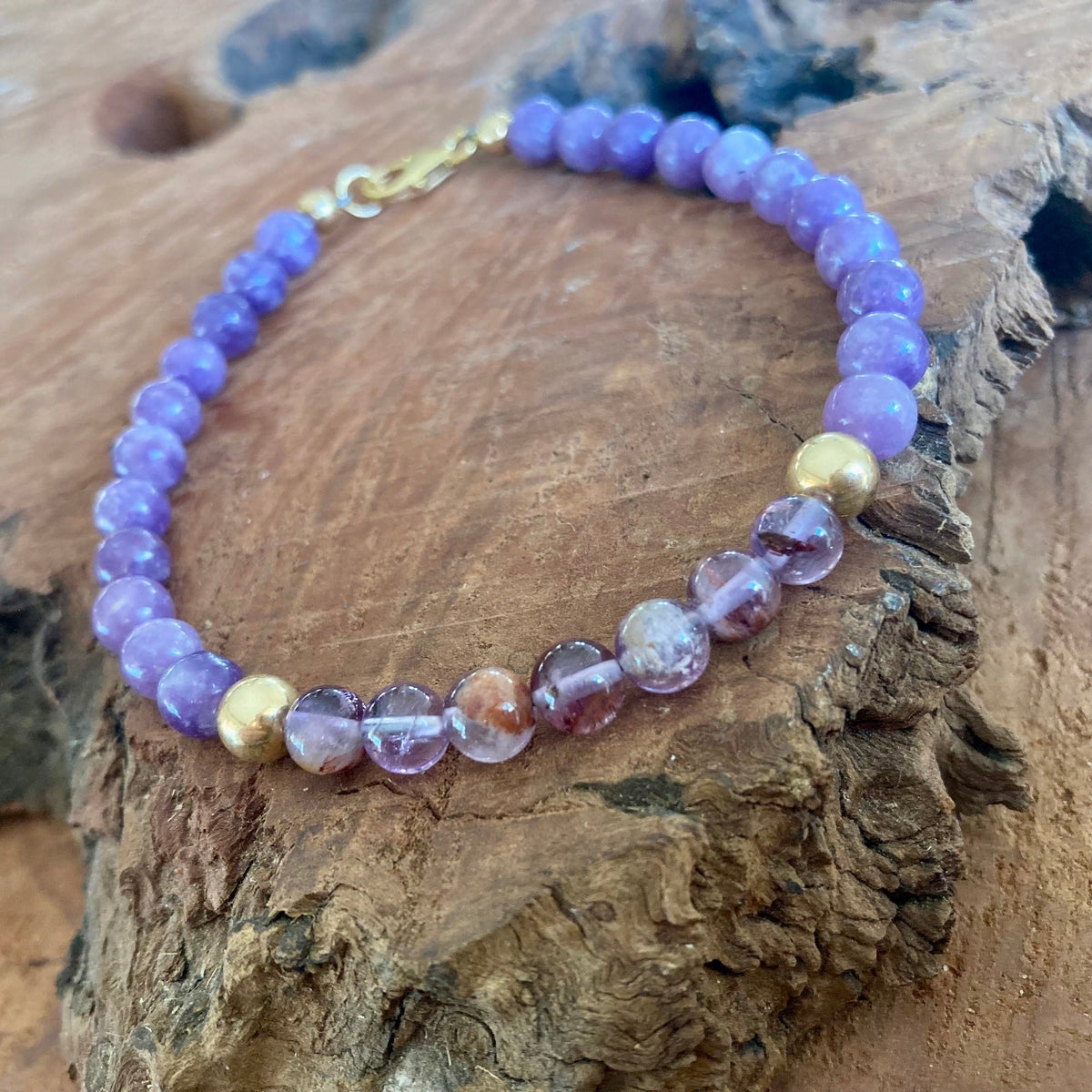 Purple lodolite beads with inner inclusions on The Visionary bracelet