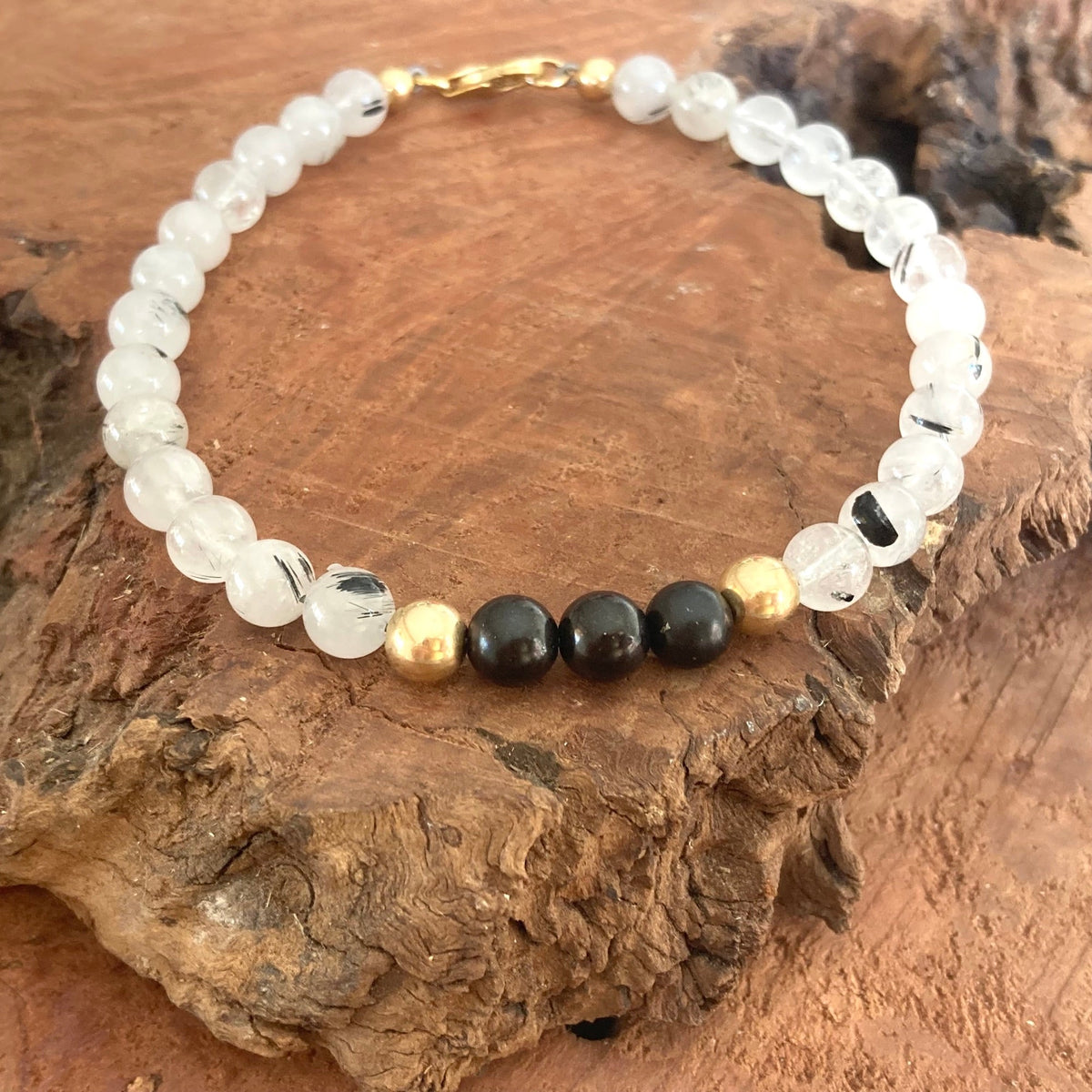 Tourmalinated quartz beads with black needle inclusions on The Integrator bracelet